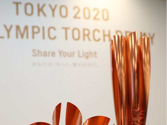 Олимпын бамбарыг Токиогийн музейд түр байрлууллаа