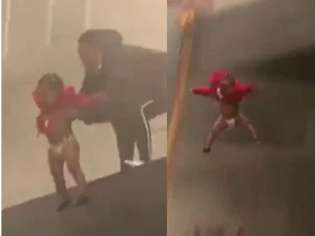 ВИДЕО: Нялх хүүхдээ аврахын тулд шатаж буй барилга дээрээс шиджээ